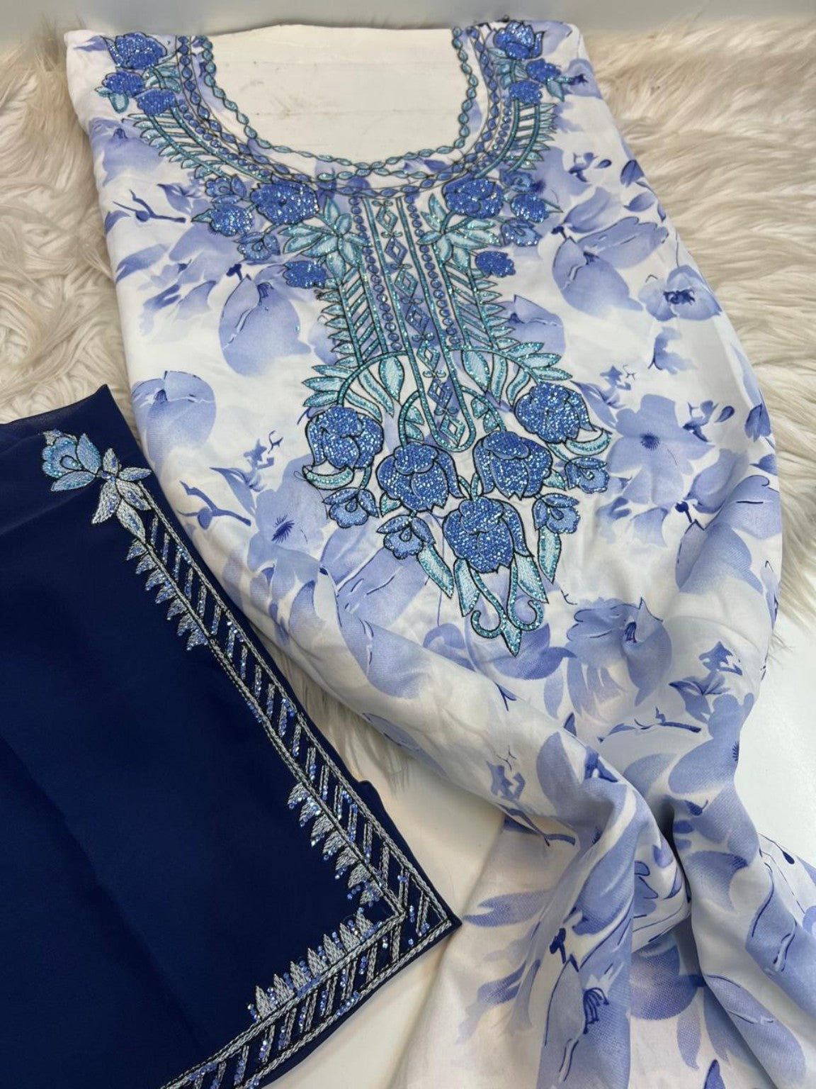 Blue and white floral mukhawar fabric with blue embroidered neckline and navy shayla